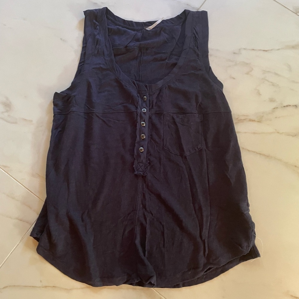 Drapey tank from free people.